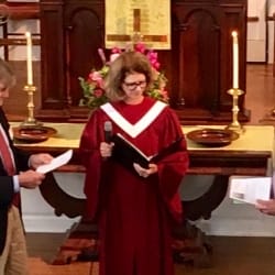 The church moderator and a retired pastor thank Brent for his service