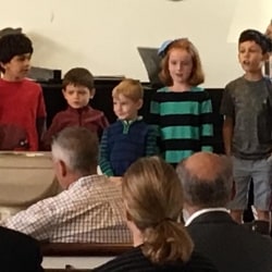Children sing in the kids choir