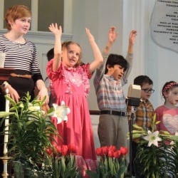 Children sing in the kids choir on Easter Sunday
