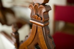 Detail of a carved wooden chair back from the chancel of the First Congregational Church of Stockbridge