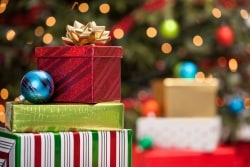 Christmas gifts under a tree
