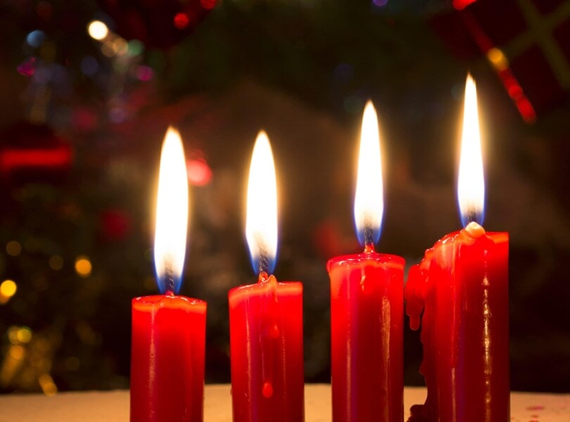 Four red Christmas candles