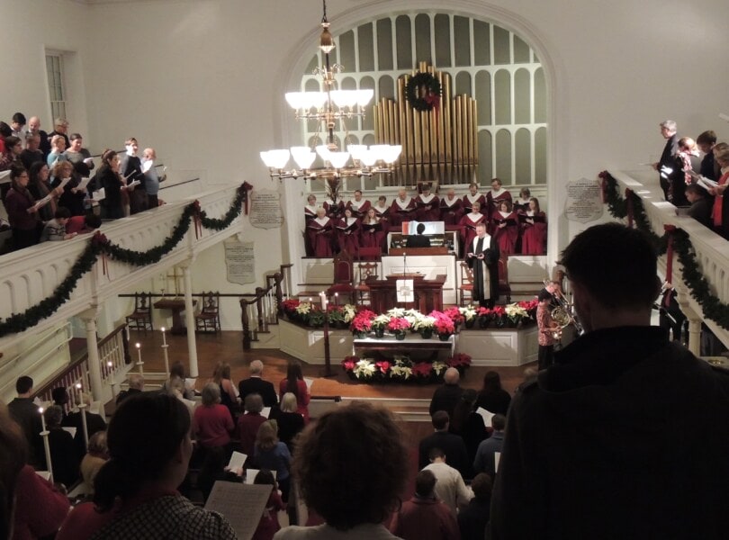 A full view of the sanctuary from the balcony, filled with people