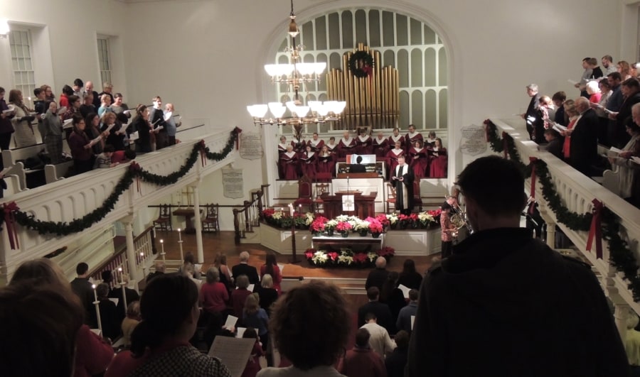 A full view of the sanctuary from the balcony, filled with people