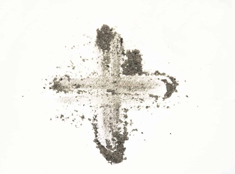 Ashes smudged in the shape of a cross